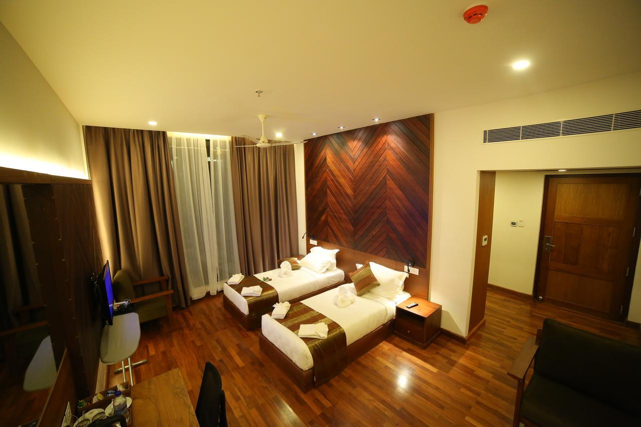 Woodies Bleisure Hotel Kóžikkót Exteriér fotografie